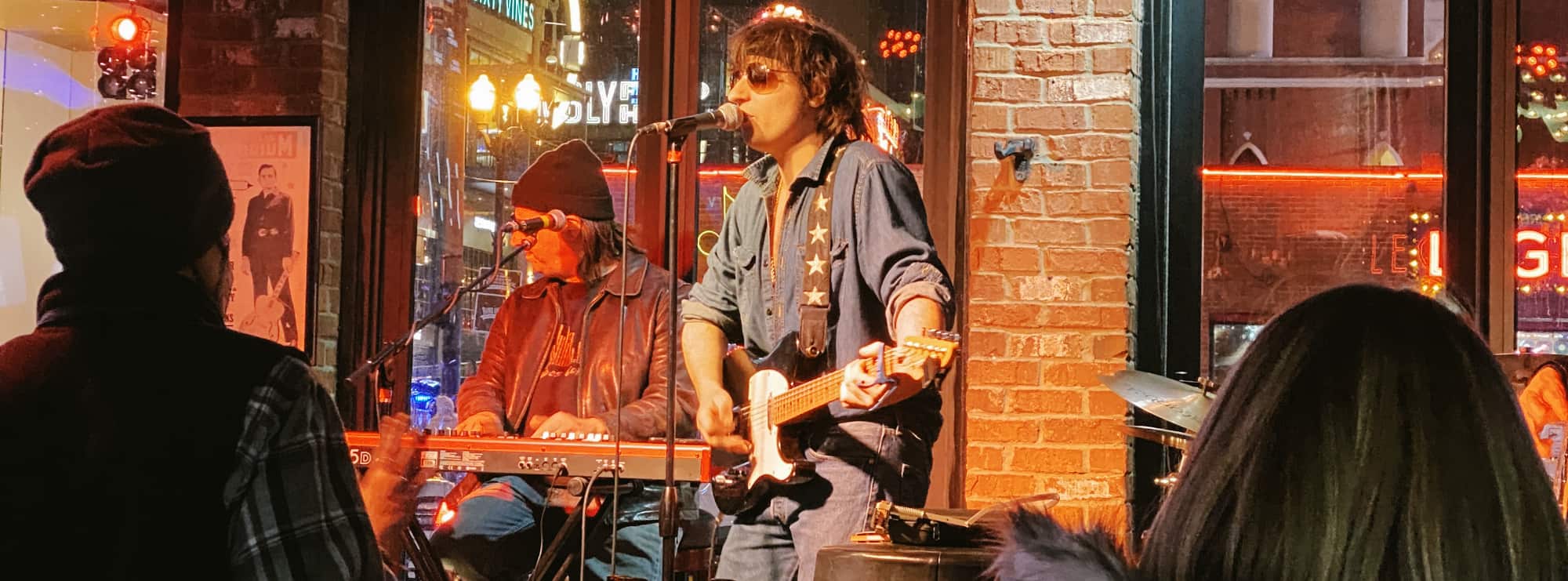 bar singer on guitar in Green Bay