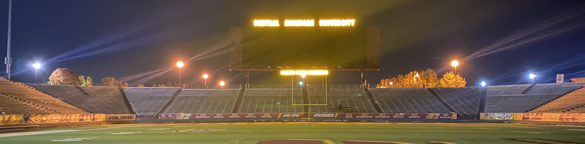 empty football stadium at night under the lights Green Bay