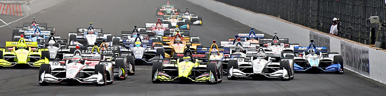 indy cars racing to through the start line Green Bay